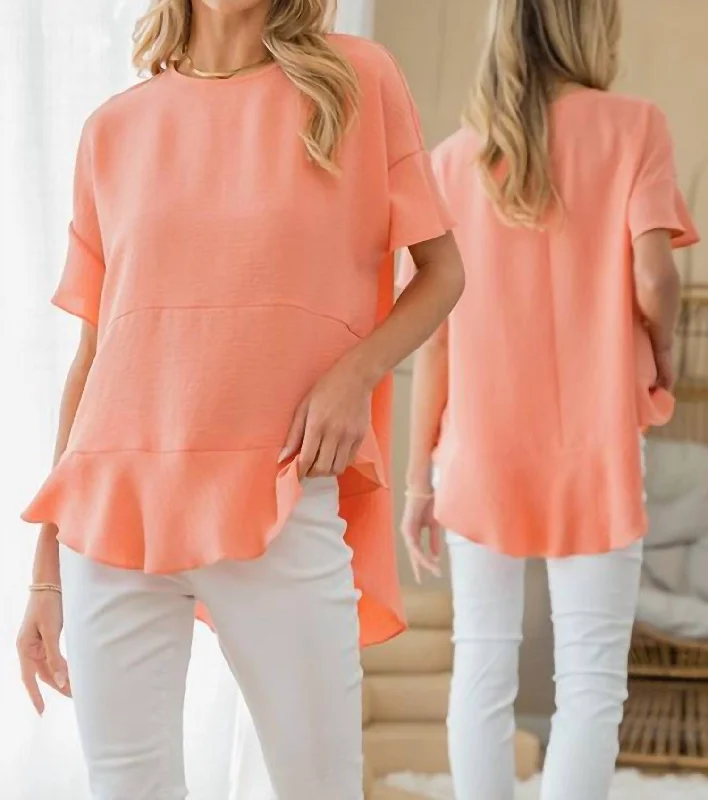 Street Chic Discounts Coral Round Neck Ruffle Hem Top